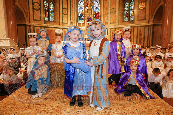 St. Ronan's Primary School performing Chirstmas Carols in The Holy Cross Church, Lisnaskea.