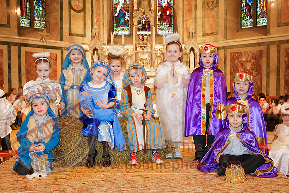 St. Ronan's Primary School performing Chirstmas Carols in The Holy Cross Church, Lisnaskea.
