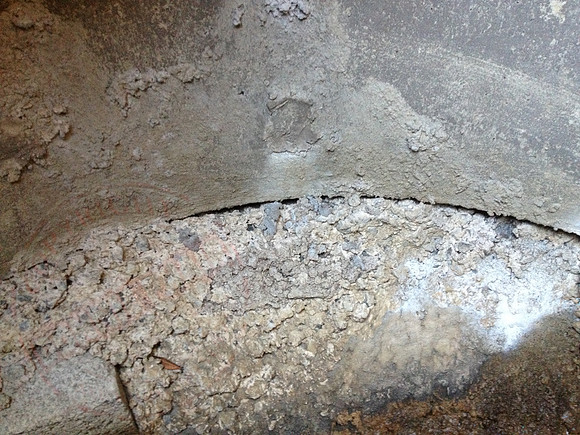 Sump in neighbours' garden that's not benched or made watertight.