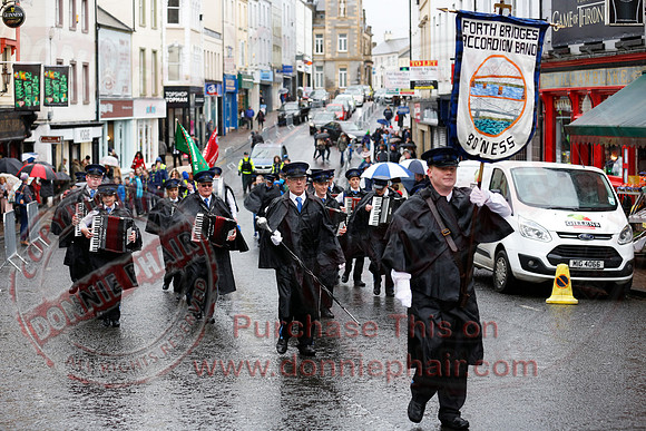 St. Michael's Scouts walk to St. Michael's Church.