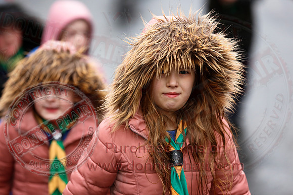 St. Michael's Scouts walk to St. Michael's Church.