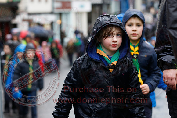 St. Michael's Scouts walk to St. Michael's Church.