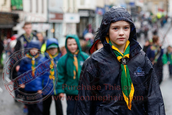 St. Michael's Scouts walk to St. Michael's Church.