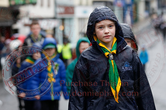 St. Michael's Scouts walk to St. Michael's Church.
