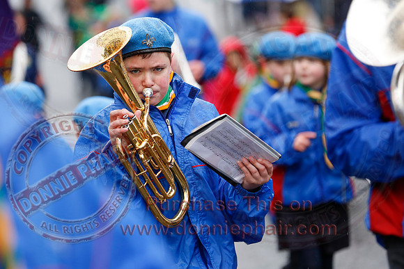 St. Michael's Scouts walk to St. Michael's Church.