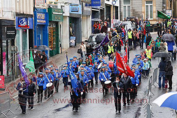 St. Michael's Scouts walk to St. Michael's Church.