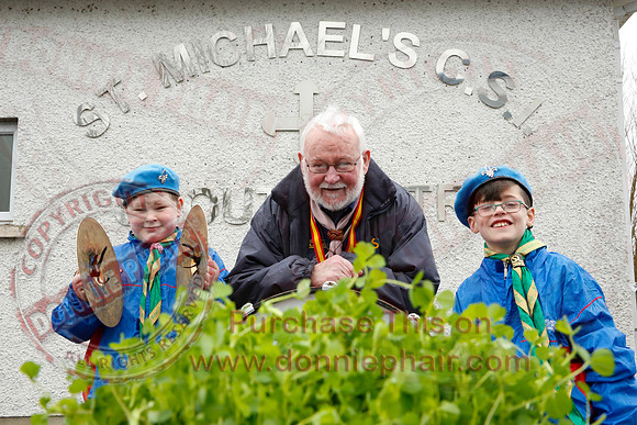 St. Michael's Scouts walk to St. Michael's Church.