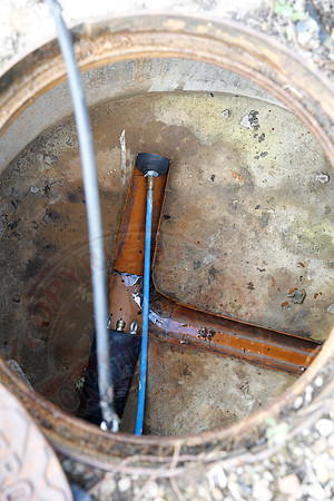 Footage and photos of NI Water completing a Dye Test on Sewer Manhole on 10/05/18.
