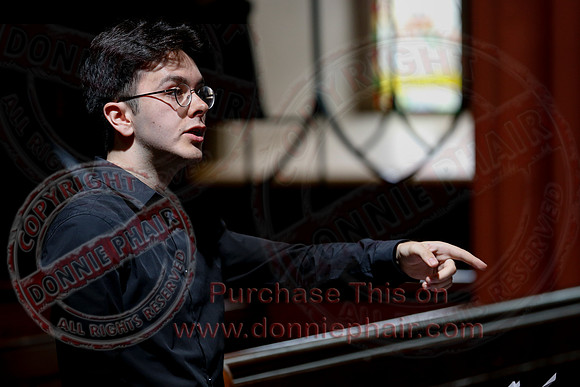 Matthew Murphy conducting the The Corpus Christi College from Oxford in St. Macartins Cathedral, Enniskillen.-10