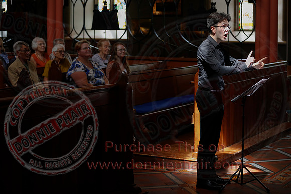 Matthew Murphy conducting the The Corpus Christi College from Oxford in St. Macartins Cathedral, Enniskillen.-11