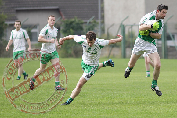 St. Joseph's Ederney V Roslea Shamrocks in Senior Men GAA League Football.
