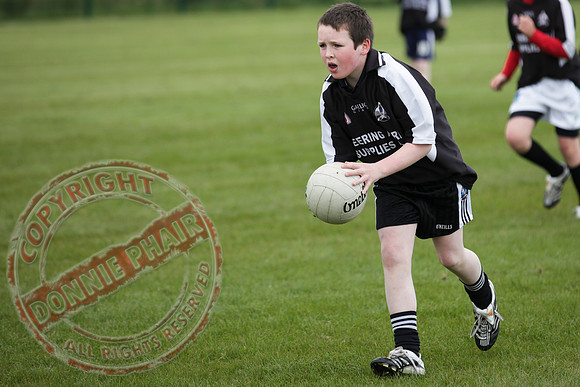 Celebrating Aghadrumsee GAA Club new playing field the U12 Aghadrumsee GAA Team play local rivals Roslea.